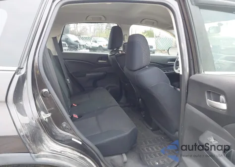 2015 Honda Cr-V Lx z USA, uszkodzony, nr VIN 2HKRM4H31FH621177